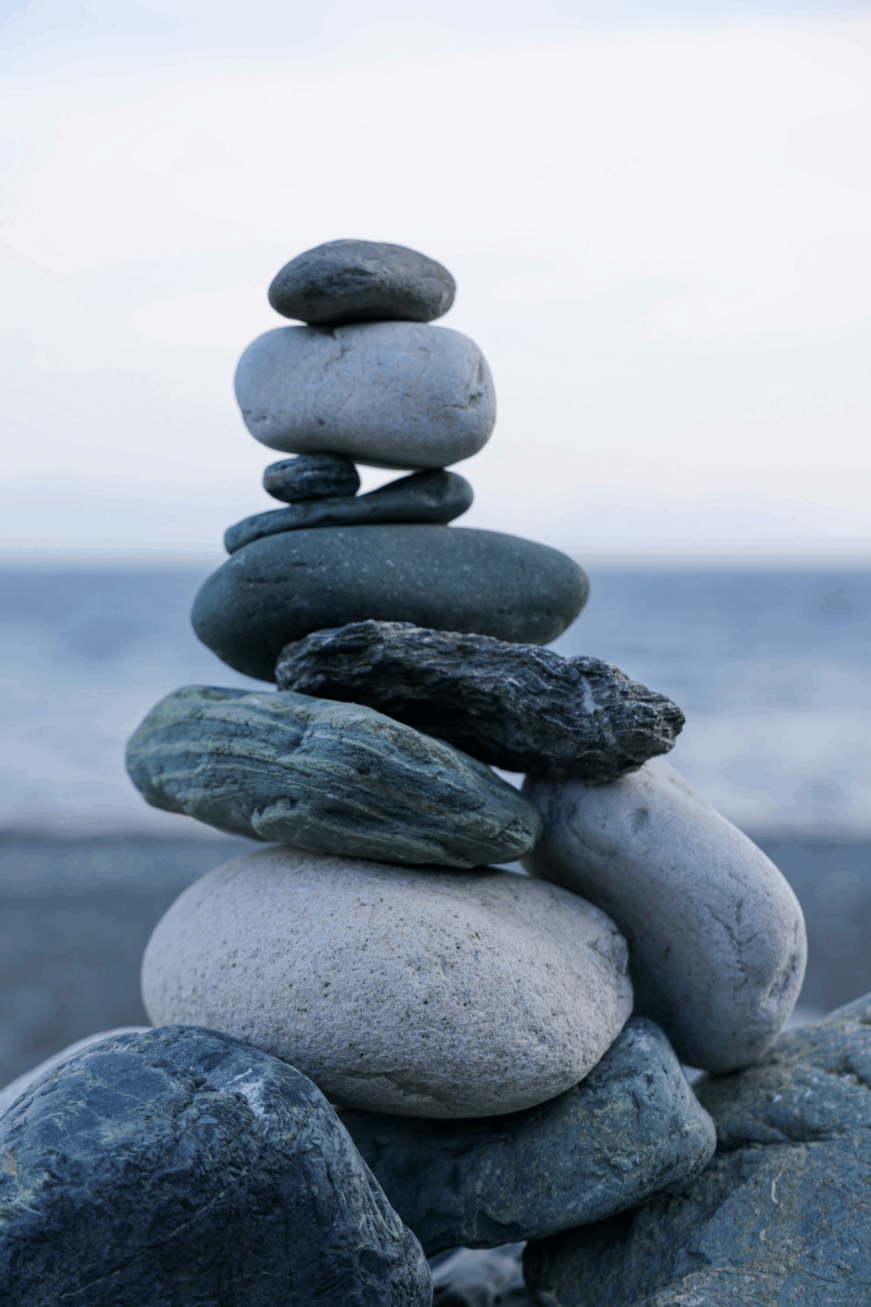 Smooth stones stacked in a balanced pile